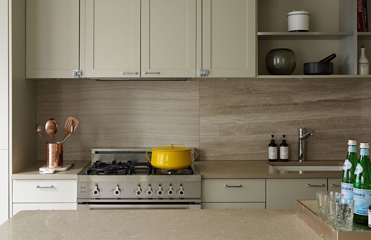 Close View of a Light Khaki Kitchen Cupboard and Yellow Saucepan