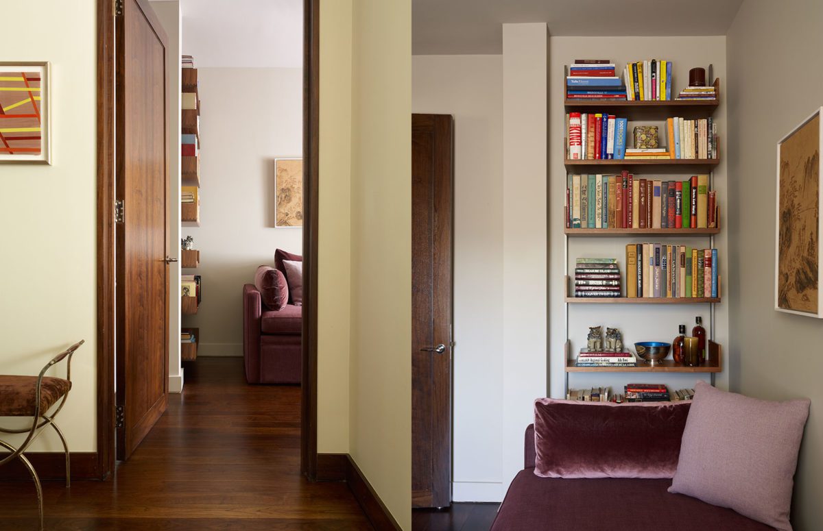 Cozy Seating area in Brown Shades and a bookshelf stuffed with books