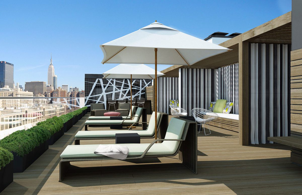 540 W 28TH Street Outdoor Rooftop with Sitting area, deck chairs and stunning views of the city