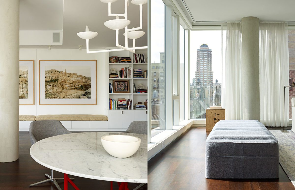 Livingroom with a Round Marble White Table and a Sitting Area with a Bookcase