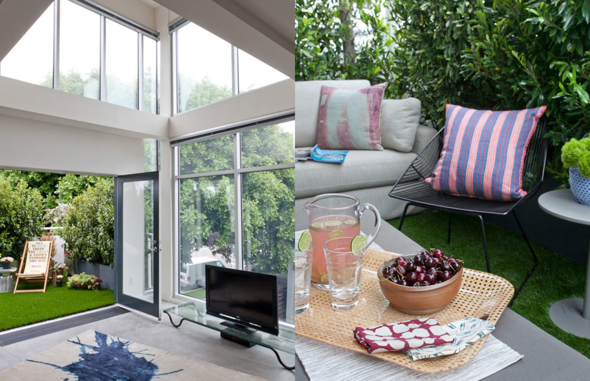 Venice loft outdoor view of a garden. Sitting area on the lawn and a table with a bowl of cherries and a fresh fruit drink