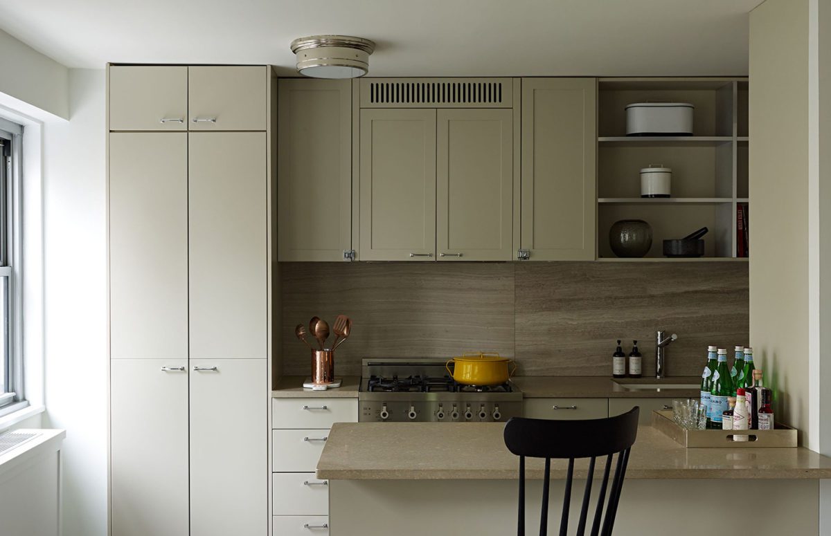 View of A Compact Kitchen and a Light Khaki Kitchen Cupboard