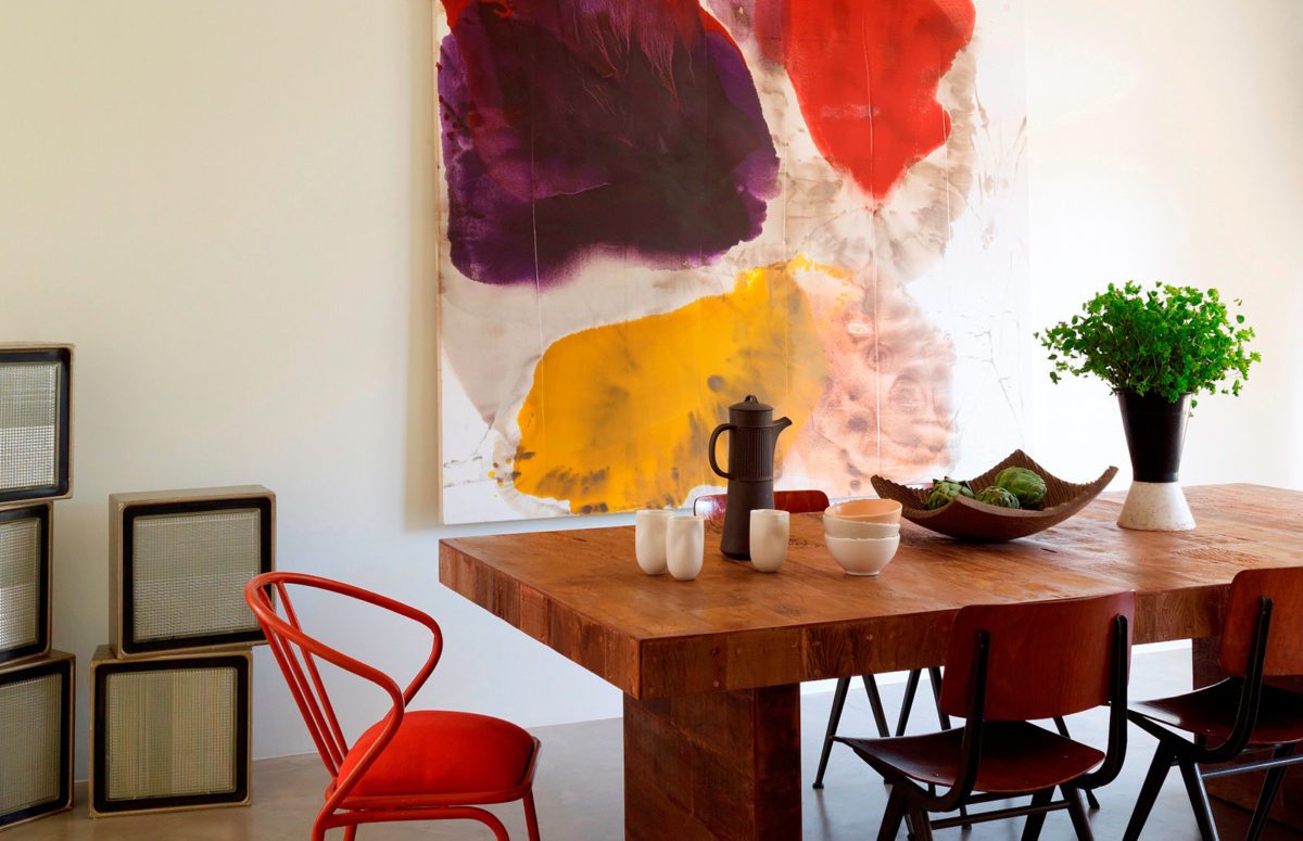 Rectangular Wooden Dining Table and An Abstract Painting with Warm Colors