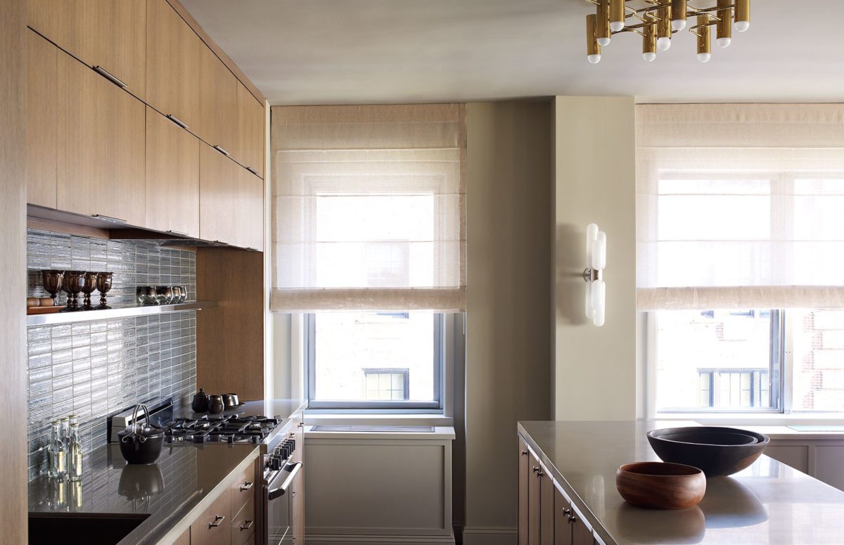 View of Light Kitchen with Wooden Cupboard