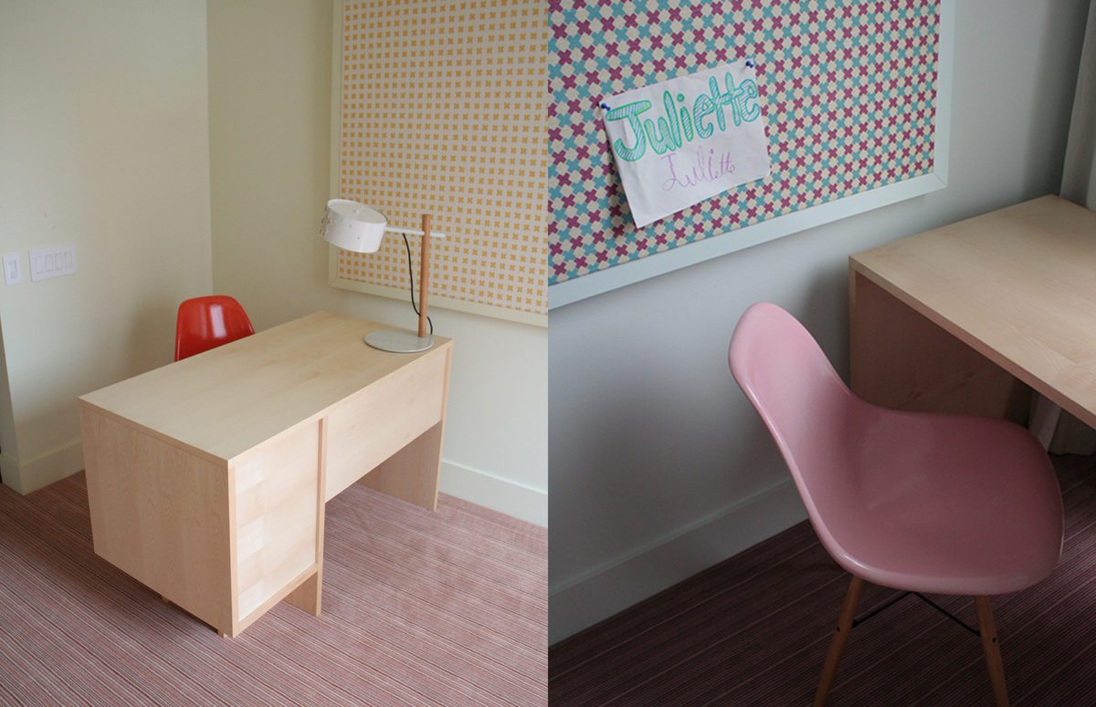 Child's wooden desks and red and pink chairs in Upper East Side residence