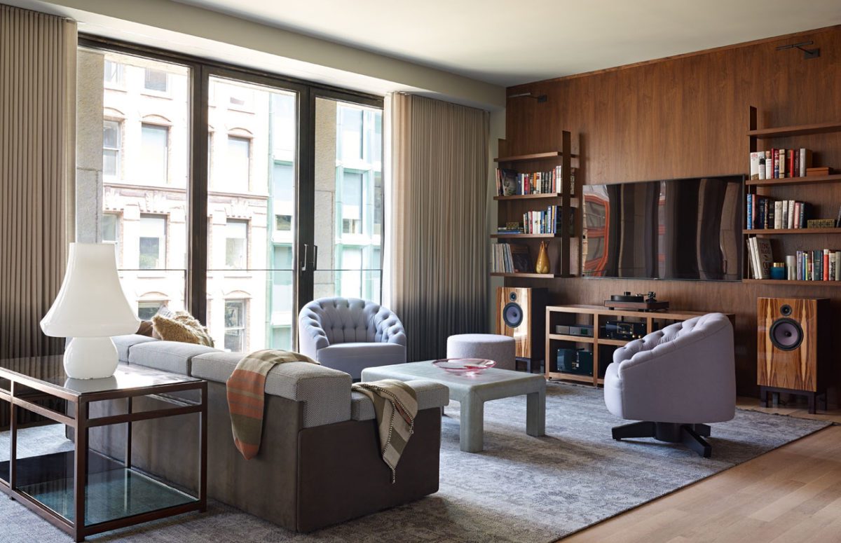 Livingroom designed using warm tones of brown and gray