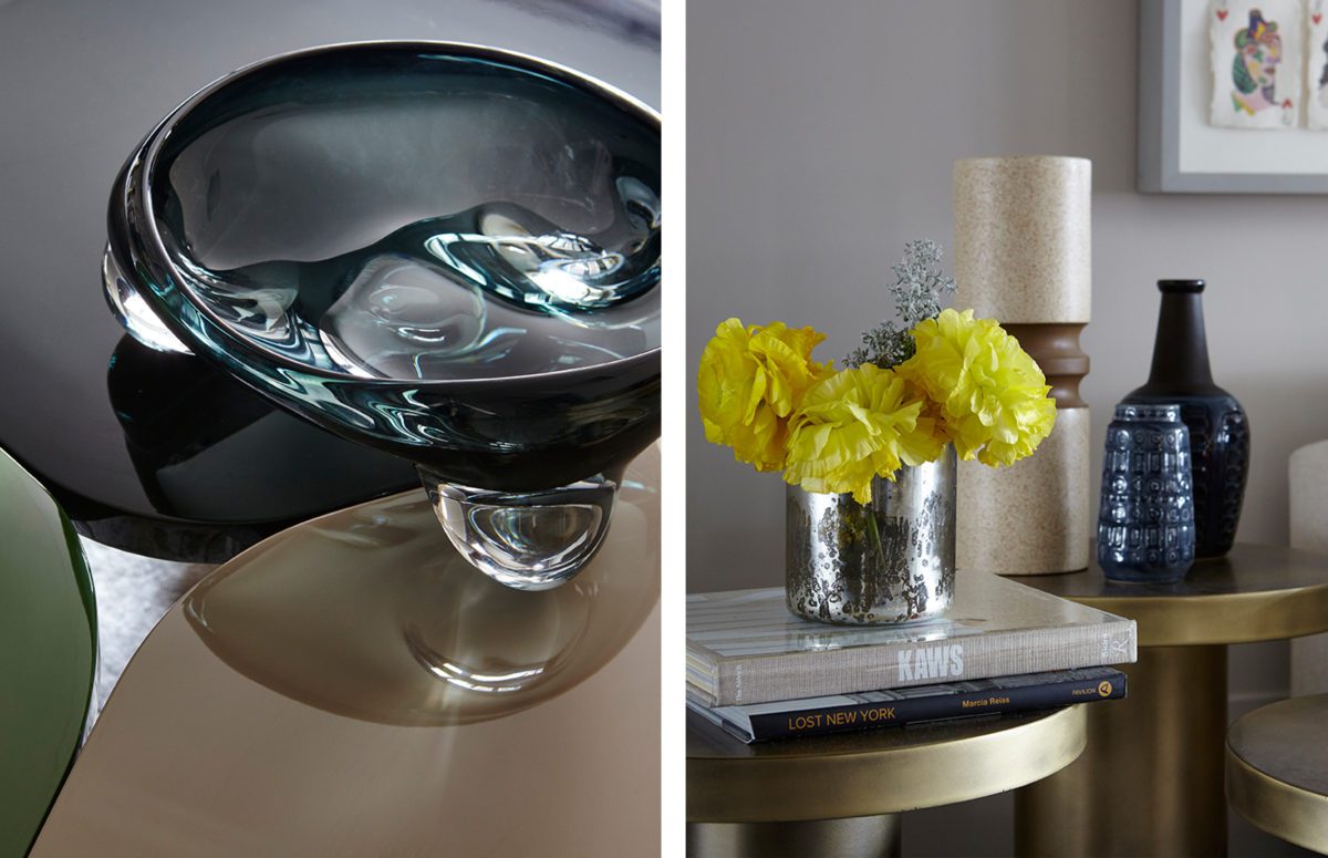Crystal Bowl on Table and Metallic Flowerpot with Yellow Flowers placed atop Books
