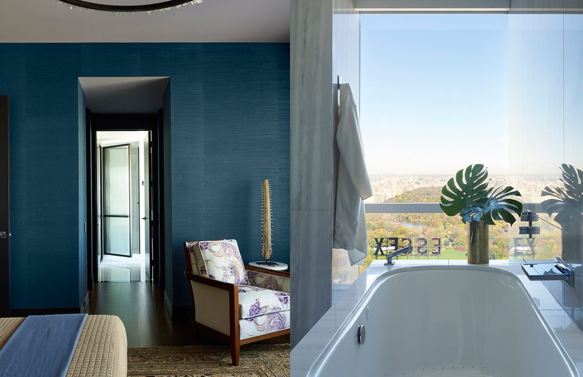 Bedroom with Blue Interior Design and a White Bathtub with Views of Central Park