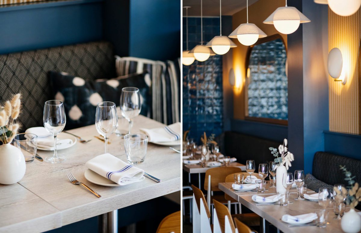 Dining Room with Blue and Yellow Interior Design and A Wooden Dining Table stuffed with Plates