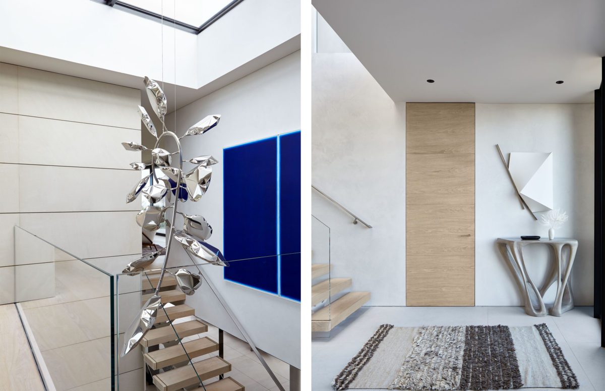 Amagansett Dunes House | View of Entrance with White Interior Design, Crystal Railing and Wooden Stairs