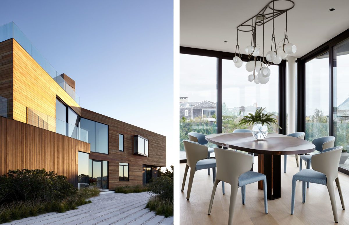 Outdoor view of a building. A wooden dining table and white and blue chairs by big windows with views of the neighborhood.