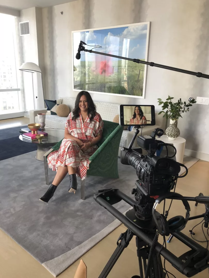 Woman Sitting on Green Chair Interview