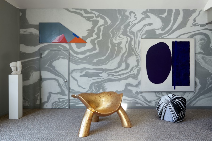 The Barn | Summer '18 | Golden Sculptural Chair, an Abstract Painting on the Wall and White and Grey Wallpaper