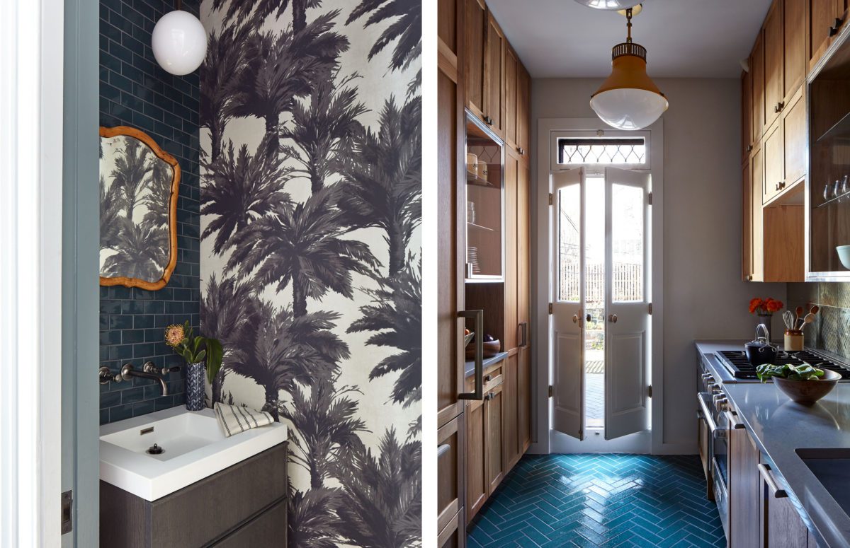 Sink Cabinet next to a Wallpaper with Palmtrees and Kitchen in Blue Shades and Wooden Furniture