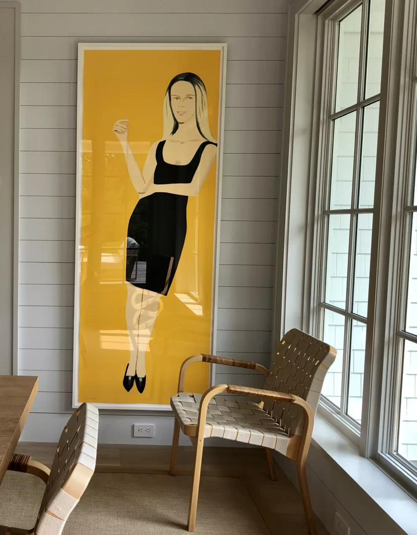 graphic art of a woman in a black dress and chair in a dining room