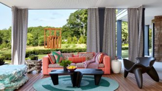 Galerie House of Art and Design | Sunset Terrace in the Garden with Cozy Orange Sofa and Sculptural Chairs