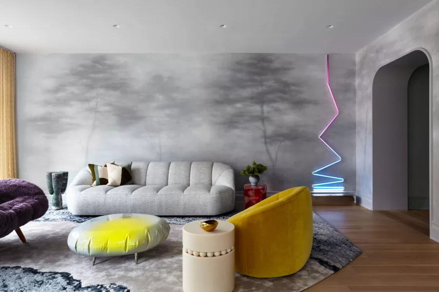 Living room design with custom painted mural and contemporary furniture