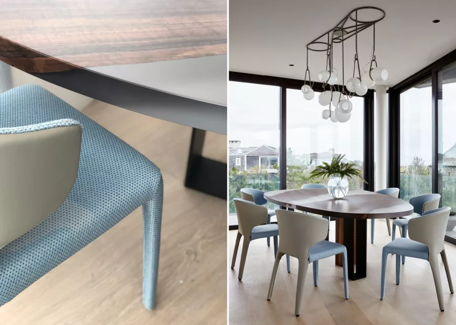 Custom dining room table with detail of putty and blue dining chairs